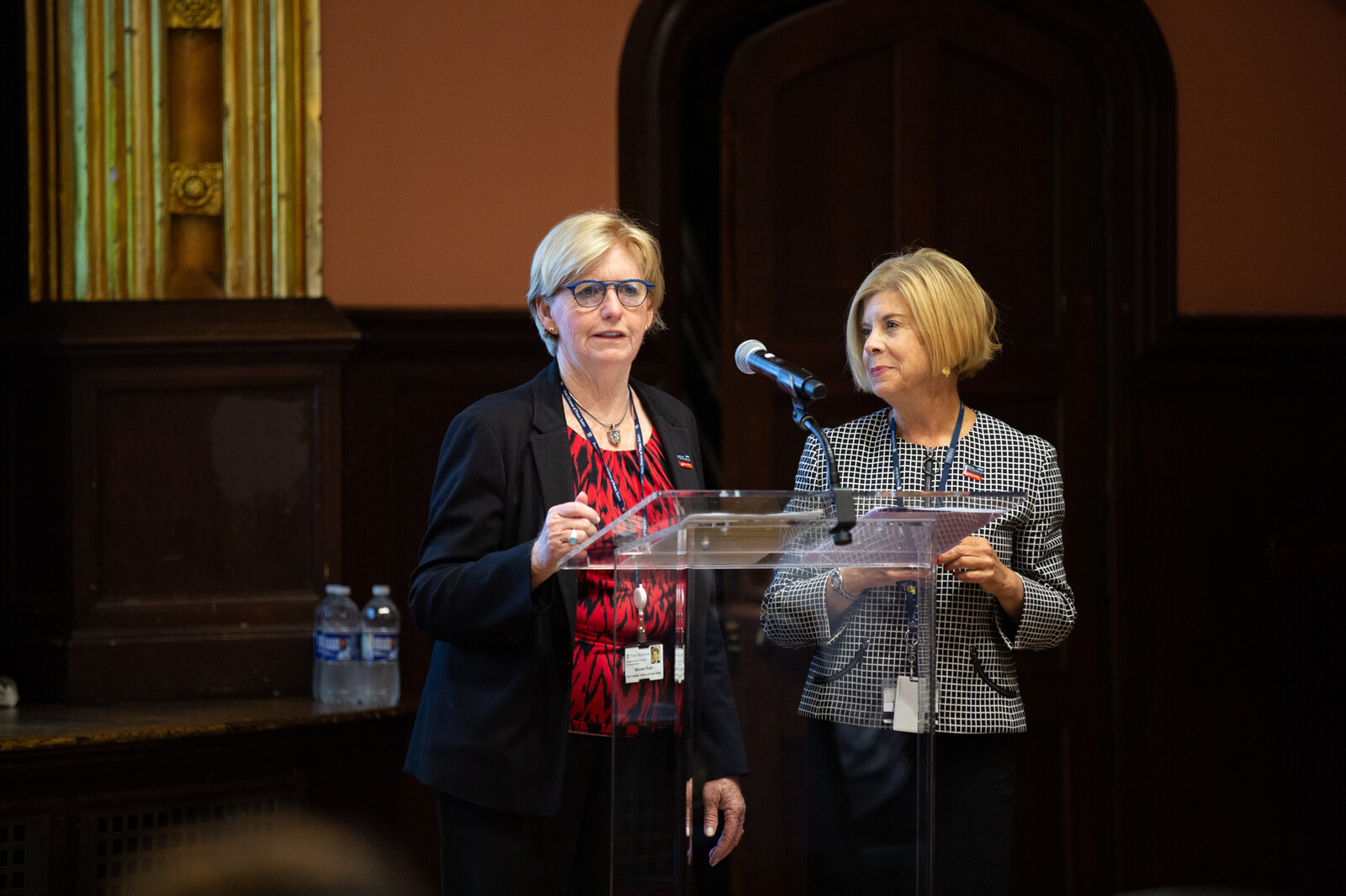 Maureen Rush & Pat Sullivan at podium